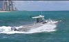 Boat just off the beach.jpg Boat just off the beach.jpg